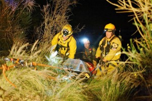 Rescuers attending to the two victims. Photo courtesy of John Conkle of Malibu SART.