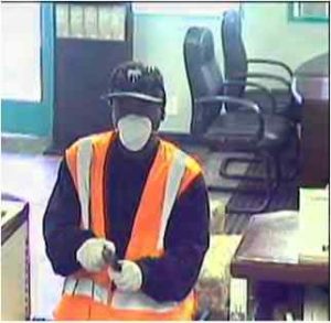 In the Aug. 4 robbery, both suspects wore surgical masks, latex gloves and construction vests. 