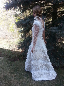 Heather Holdaway, daughter of designer Judith Henry, poses in the toilet paper wedding gown