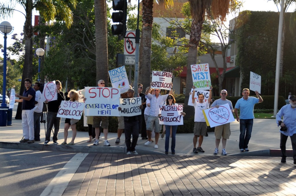 Locals gather on the corner of Santa Monica and Crescent Heights to protest planned Walgreens construction on June 2, 2008