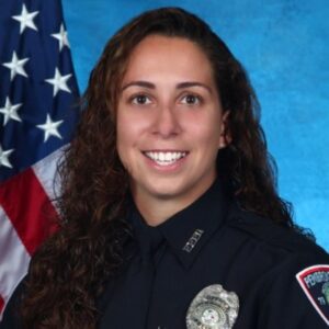 Officer Jessica Martin claims to have been refused service by 19-year-old Davenport at the Arby's restaurant.