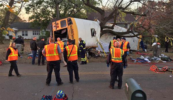 The school bus, driven by Johnthony Walker, swerved off the road and overturned, striking a tree and telephone pole.