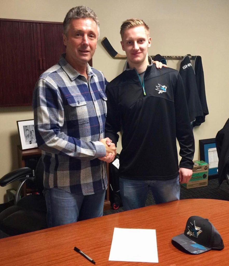 Wiederer (@wieds_21) posted this photo on Instagram with the caption: "Extremely honored and proud to sign my first NHL contract with the @sanjosesharks ! thanks to my family, friends, teammates, coaches, my agents and everyone who helped and supported me along the way! #sharks"