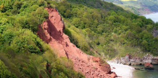 Rockslide Buries Yerba Buena Road