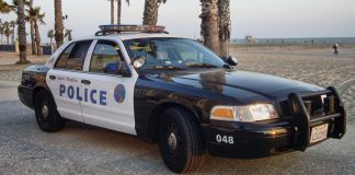 Armed Man Barricades Himself Behind Dumpster