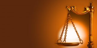 Murder Suspect Restrained After Courtroom Brawl