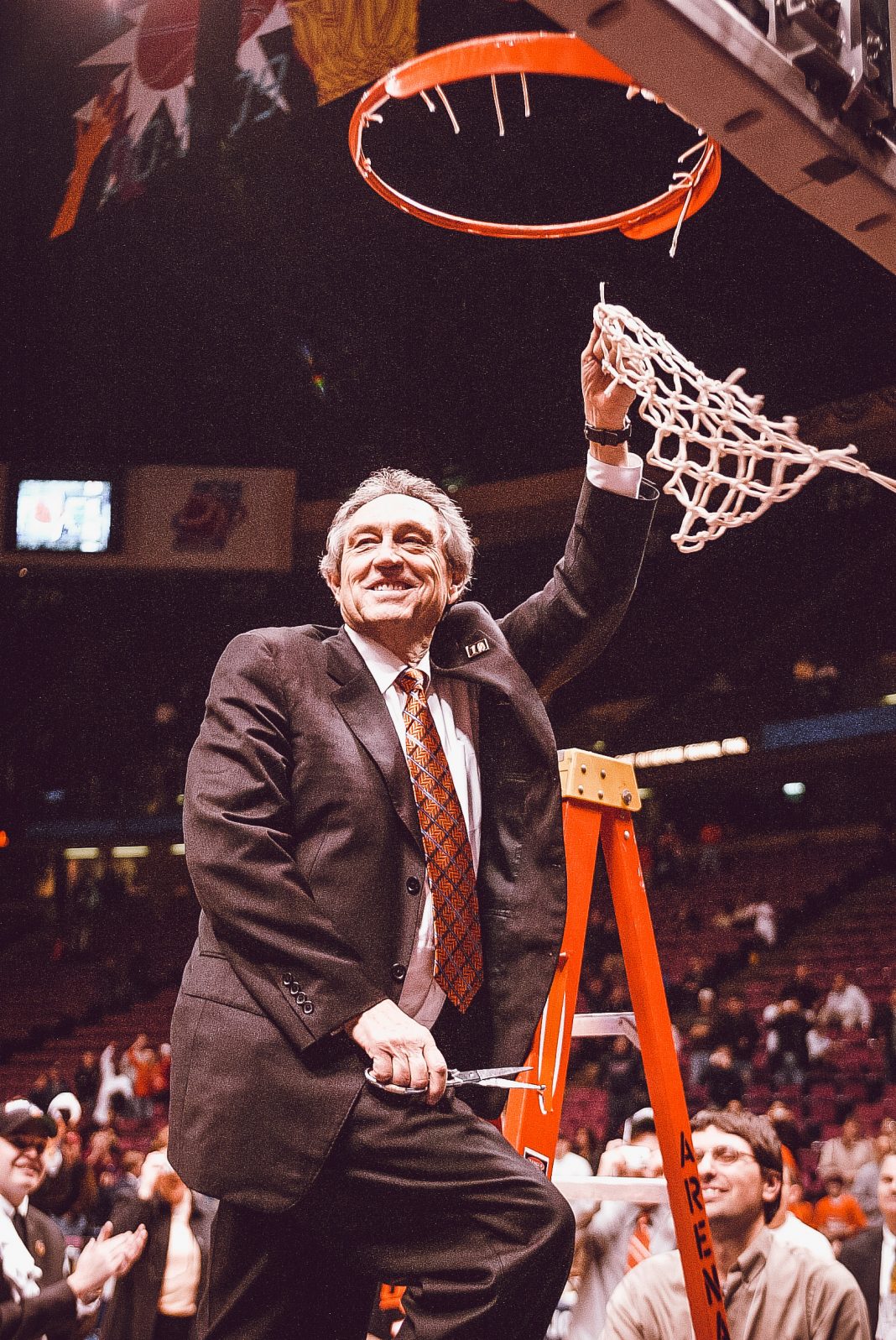 Eddie Sutton cuts down the nets after advancing to the Final Four.