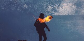 Man Carrying Torch, Arrested For Arson